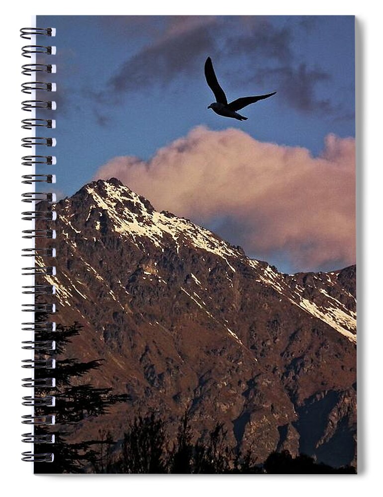 Bird Against The Mountains Spiral Notebook featuring the photograph Bird against the mountains by Martin Smith