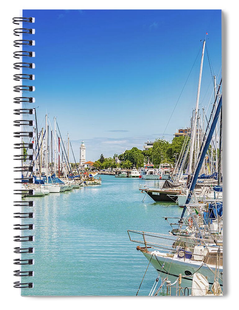 Boats Spiral Notebook featuring the photograph Boats moored in harbor channel by Vivida Photo PC