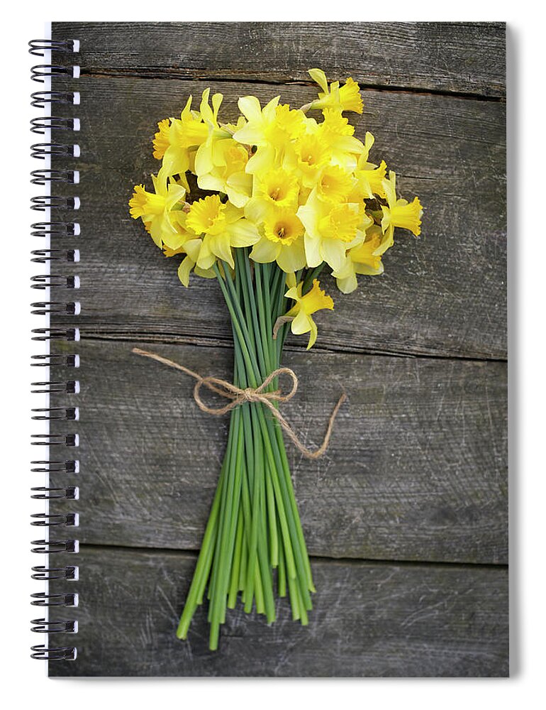 Outdoors Spiral Notebook featuring the photograph Bunch Of Daffodils On A Wooden Table by Dougal Waters