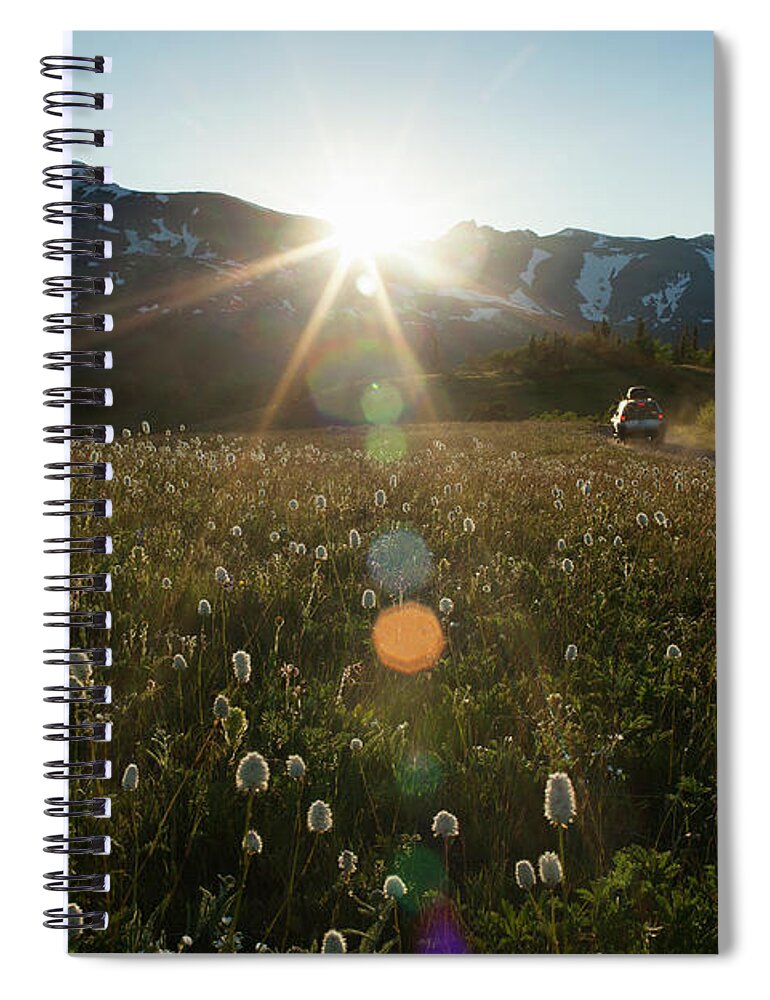 Scenics Spiral Notebook featuring the photograph Car On Rural Dirt Road In Mountains At by Noah Clayton