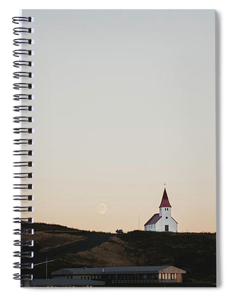 Architecture Spiral Notebook featuring the photograph Church on top of a hill and under a mountain, with the moon in the background. by Joaquin Corbalan