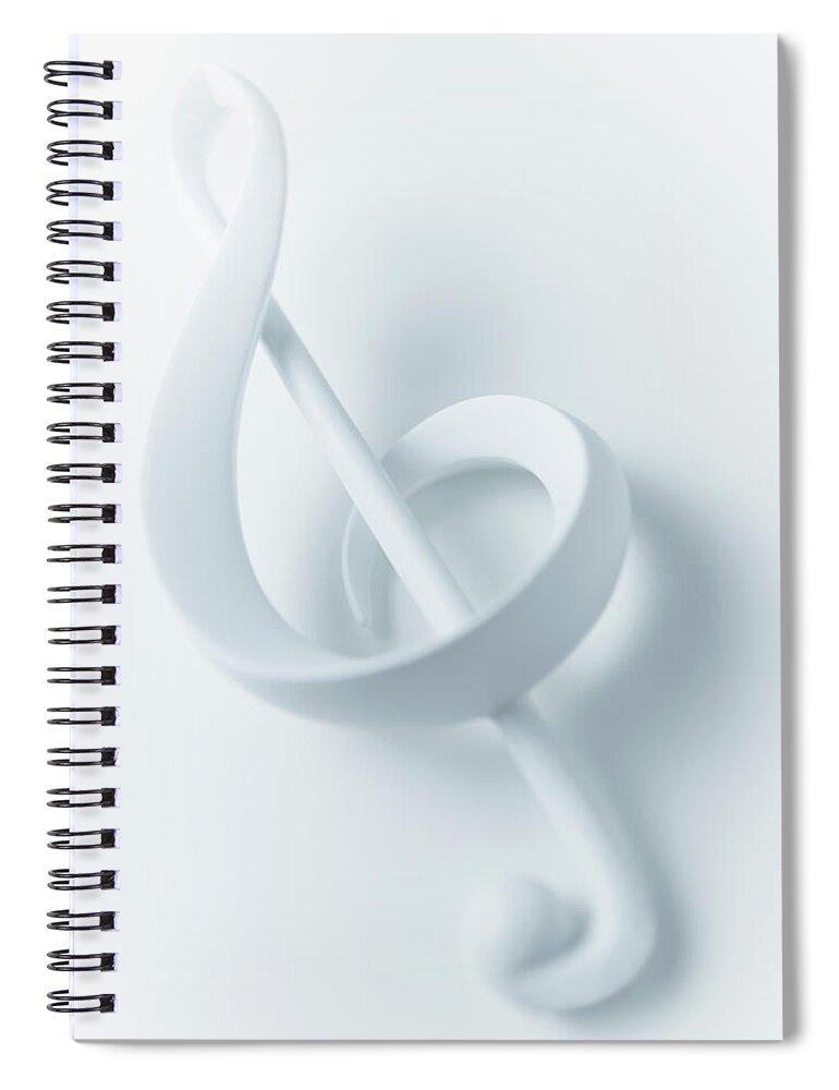 Vertical Spiral Notebook featuring the photograph Close Up Of Treble Clef Musical Note On by Adam Gault