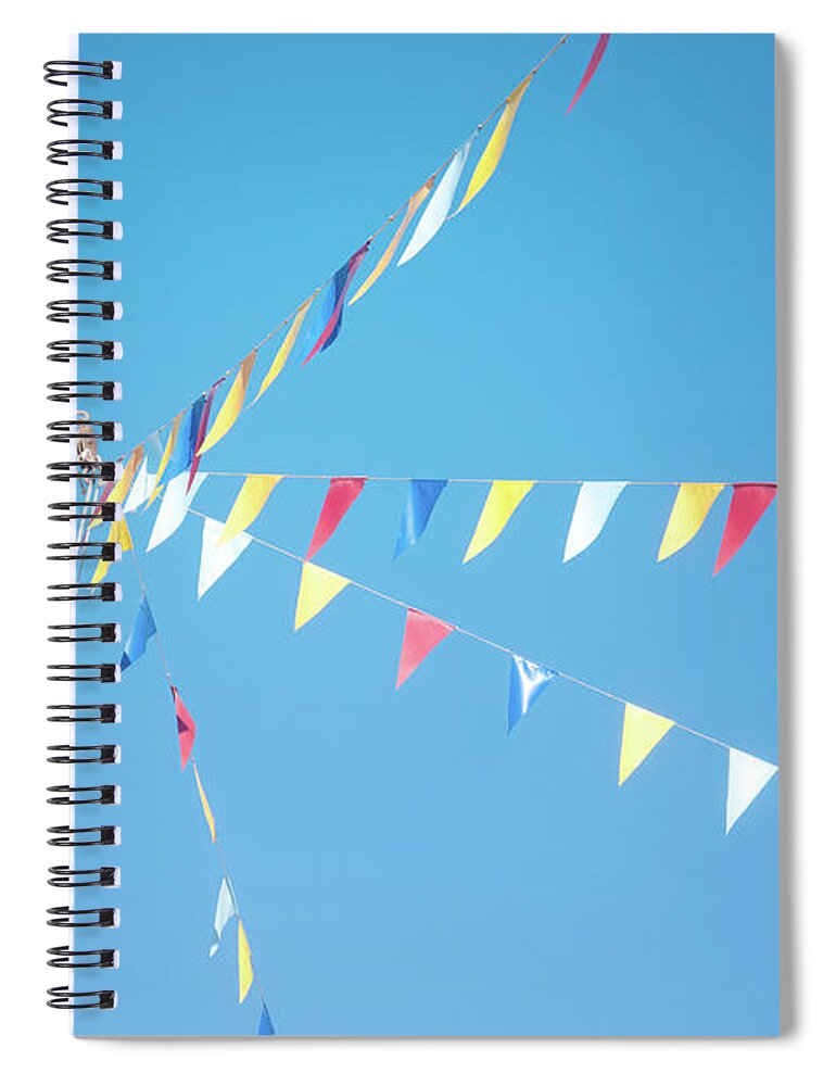 Pole Spiral Notebook featuring the photograph Colorful Flags Above Blue Sky by Marta Nardini