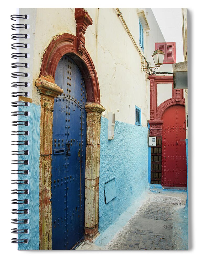Arch Spiral Notebook featuring the photograph Colourful Painted Doors On Houses In by Diane Levit / Design Pics