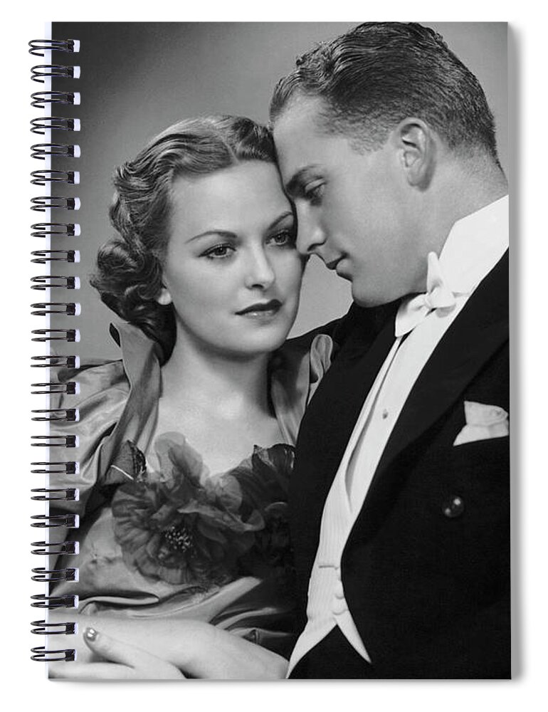 Heterosexual Couple Spiral Notebook featuring the photograph Couple Dressed Up Cuddling by George Marks