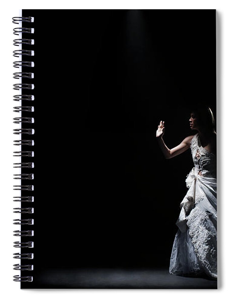 People Spiral Notebook featuring the photograph Dancer In Gown Under Spotlight On Stage by Patrik Giardino