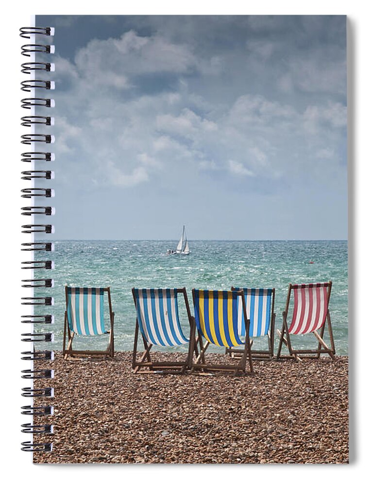 Outdoors Spiral Notebook featuring the photograph Deck Chairs And Yacht by Darren Lehane