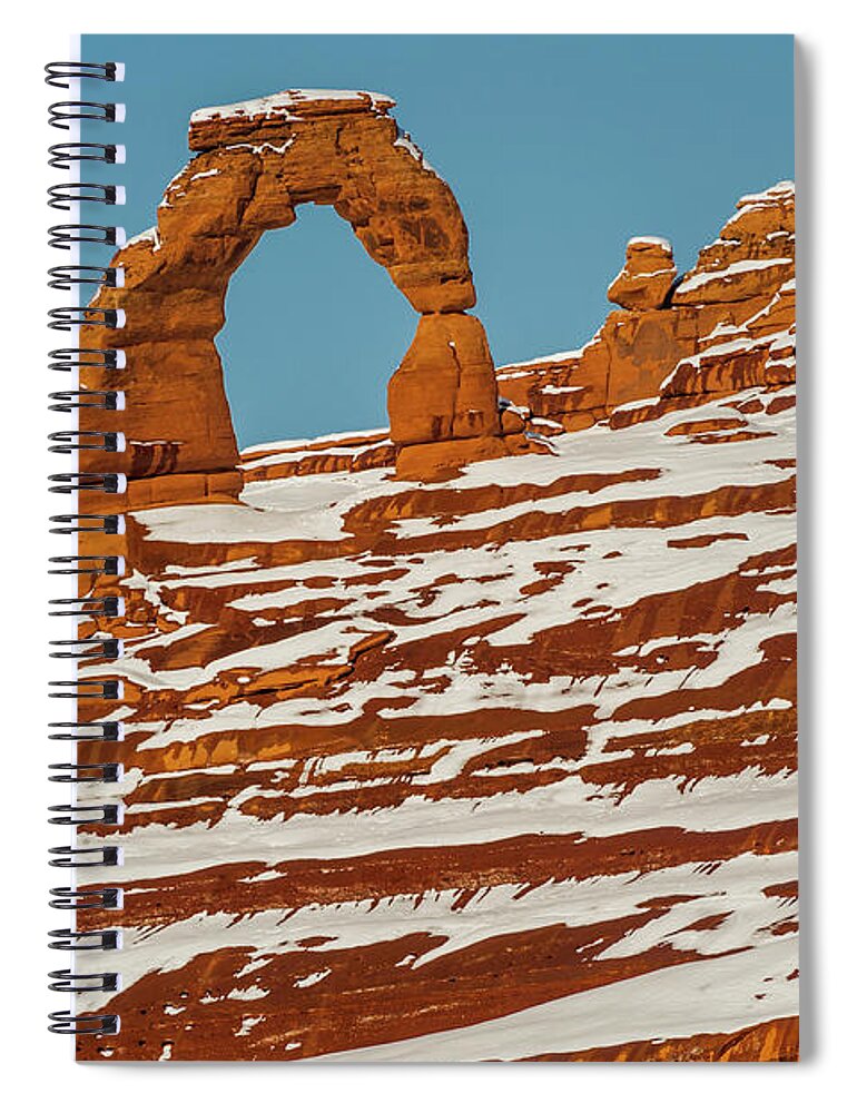 Jeff Foott Spiral Notebook featuring the photograph Delicate Arch In Winter by Jeff Foott