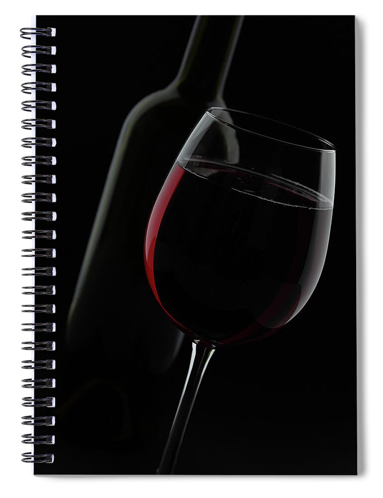 Viewpoint Spiral Notebook featuring the photograph Disposed Red Wine Glass And Bottle by Manuwe