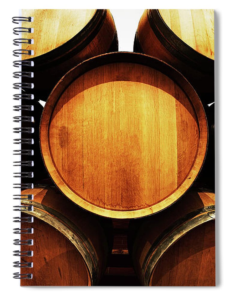 Alcohol Spiral Notebook featuring the photograph Distorted View Of Stacked Wine Barrels by Rapideye
