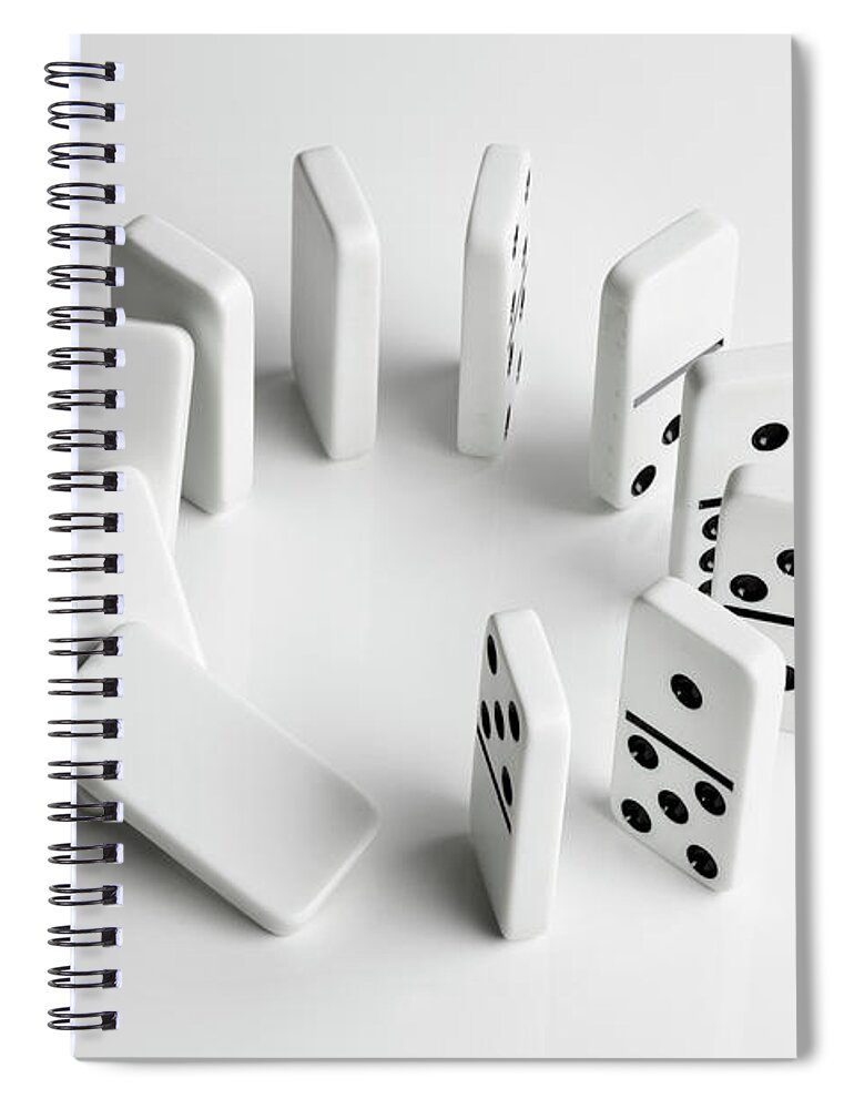 Problems Spiral Notebook featuring the photograph Dominoes In A Circle Beginning To Fall by Larry Washburn