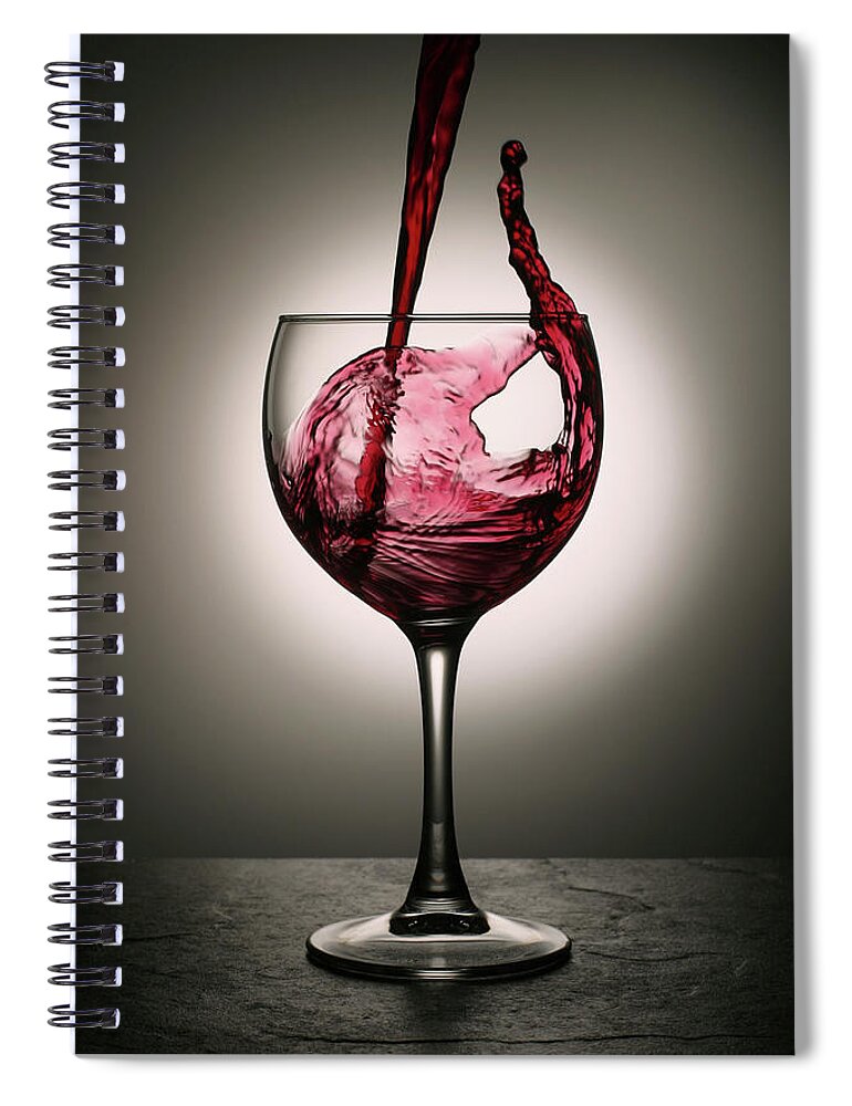 Alcohol Spiral Notebook featuring the photograph Dramatic Red Wine Splash Into Wine Glass by Donald gruener