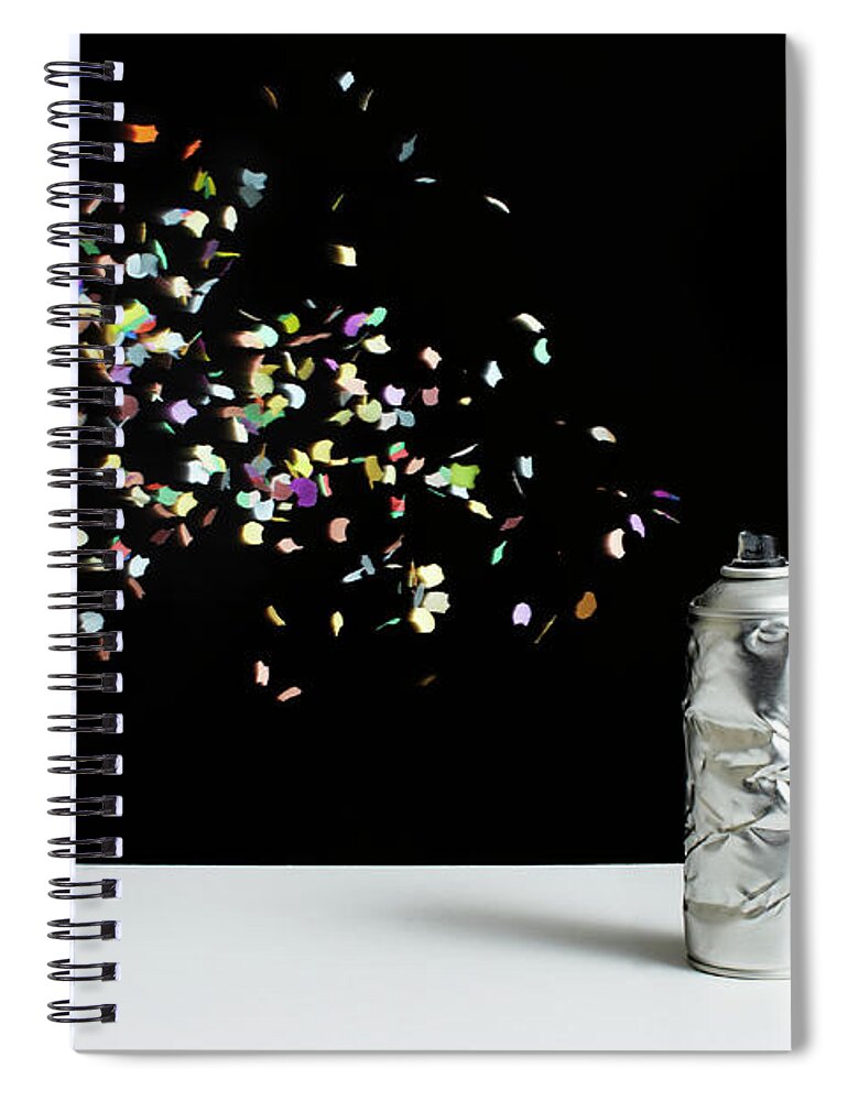 Event Spiral Notebook featuring the photograph Floating Confetti And A Damaged Spray by Benne Ochs