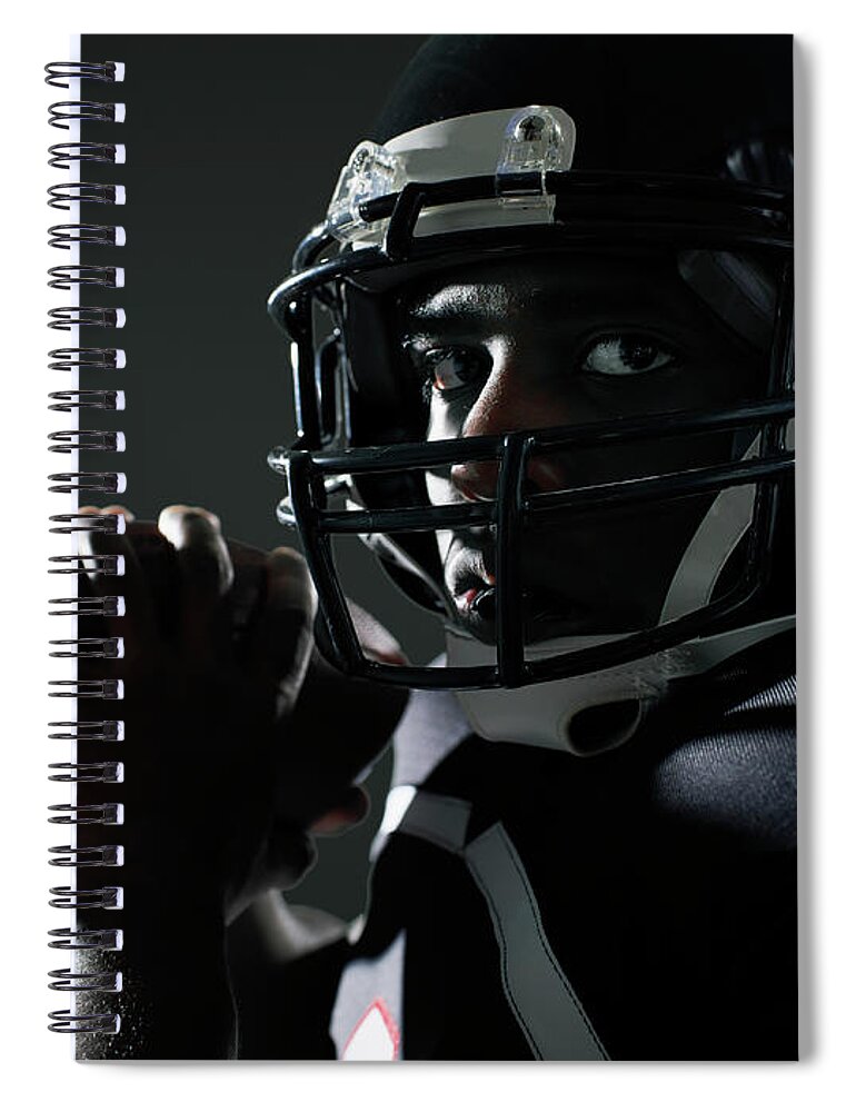 Cool Attitude Spiral Notebook featuring the photograph Football Quarterback Preparing To Throw by Thomas Barwick