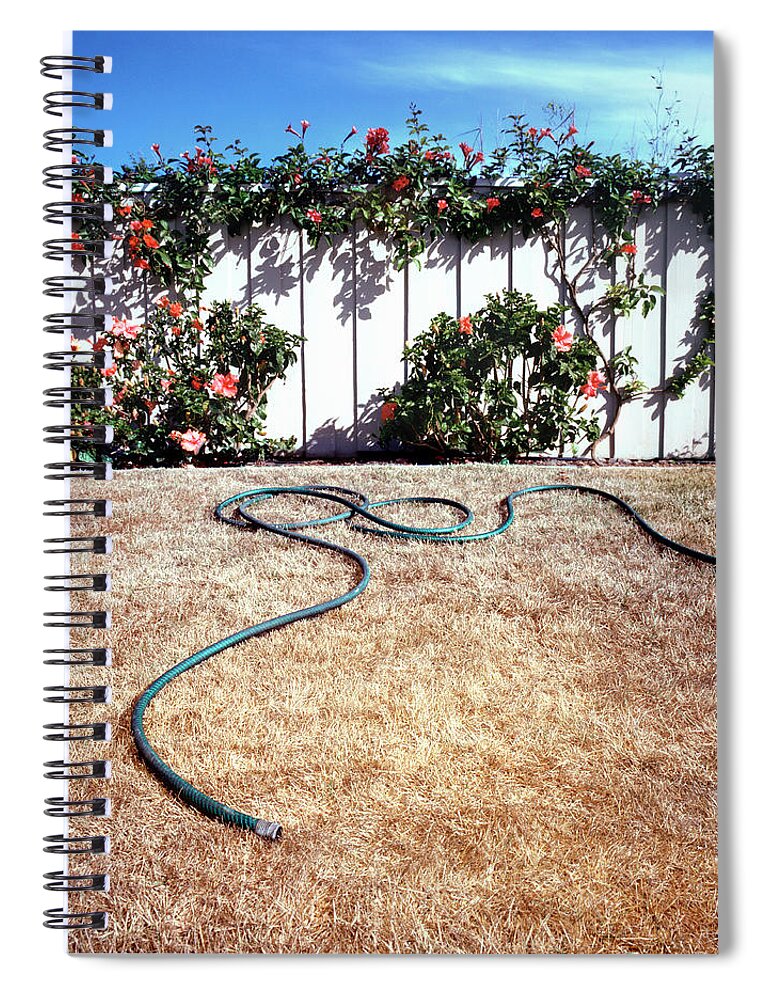 Grass Spiral Notebook featuring the photograph Garden Hose On Dry Grass by Richard Ross