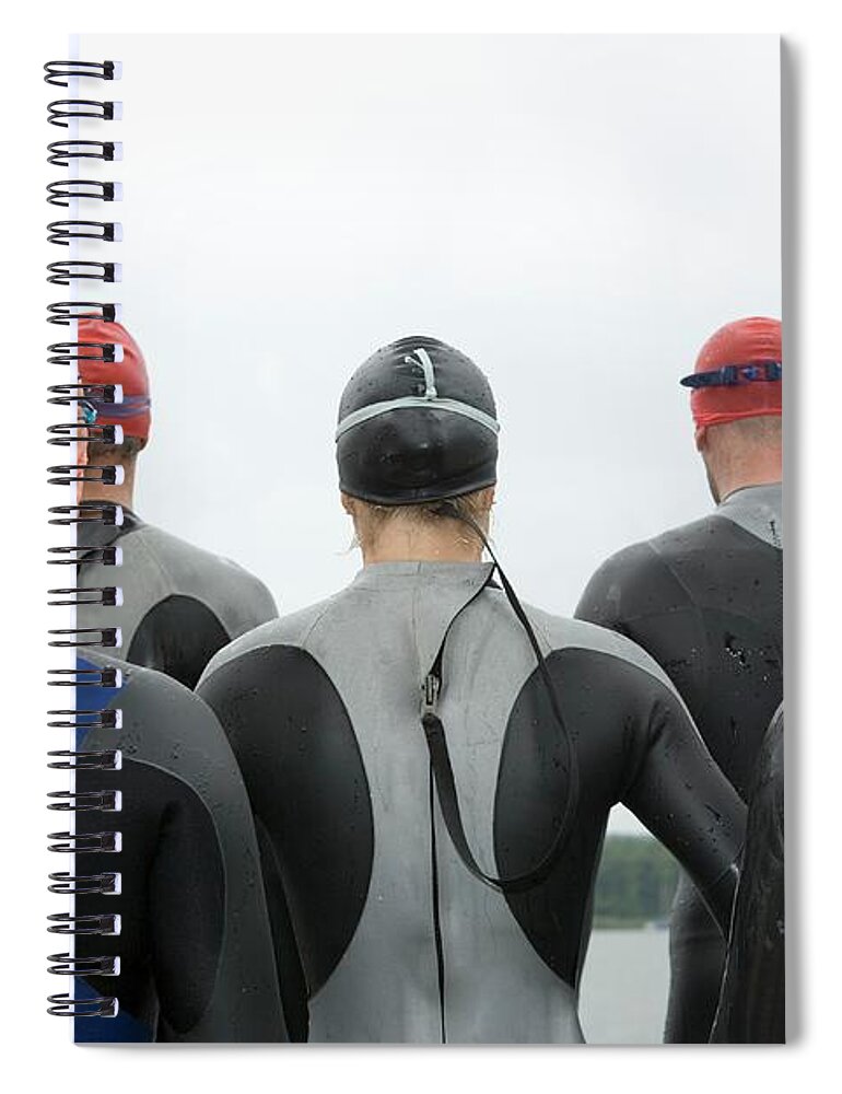 People Spiral Notebook featuring the photograph Group Of Triathletes Standing By Lake by Lothar Schulz