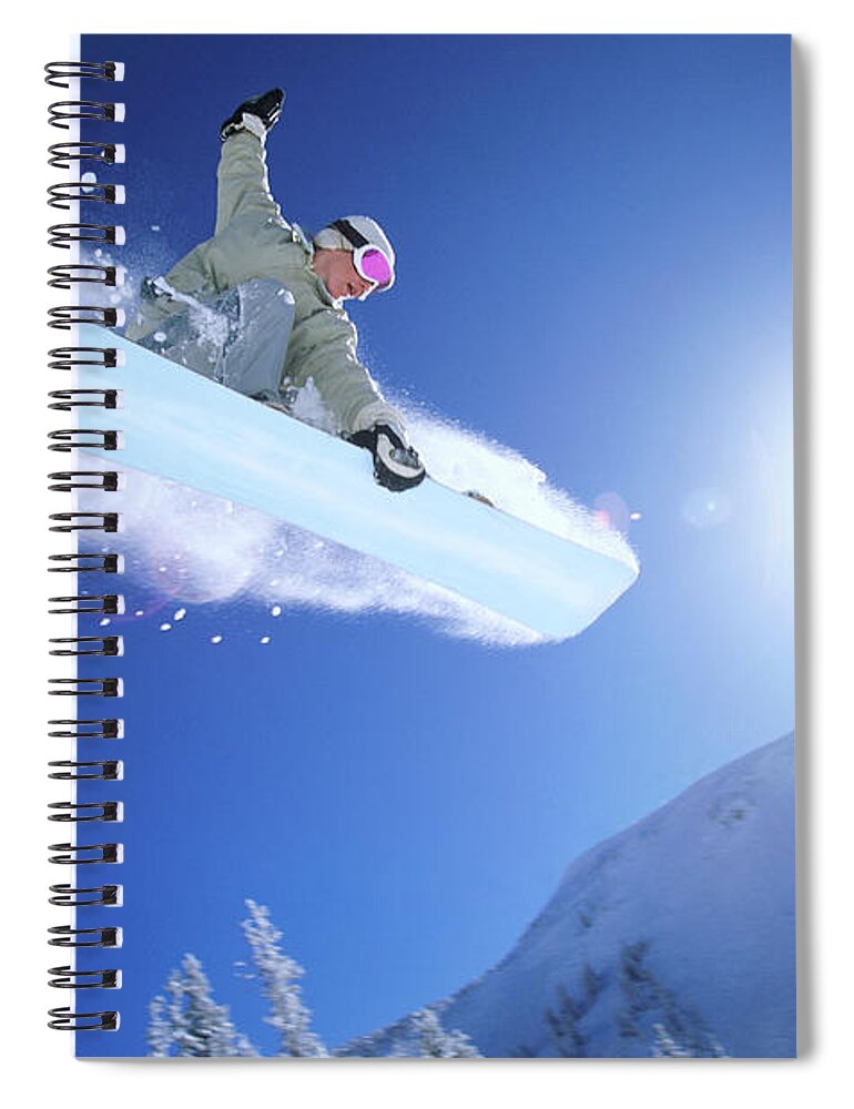 Human Arm Spiral Notebook featuring the photograph Low Angle Mid Air Shot Of A Woman by Digital Vision.