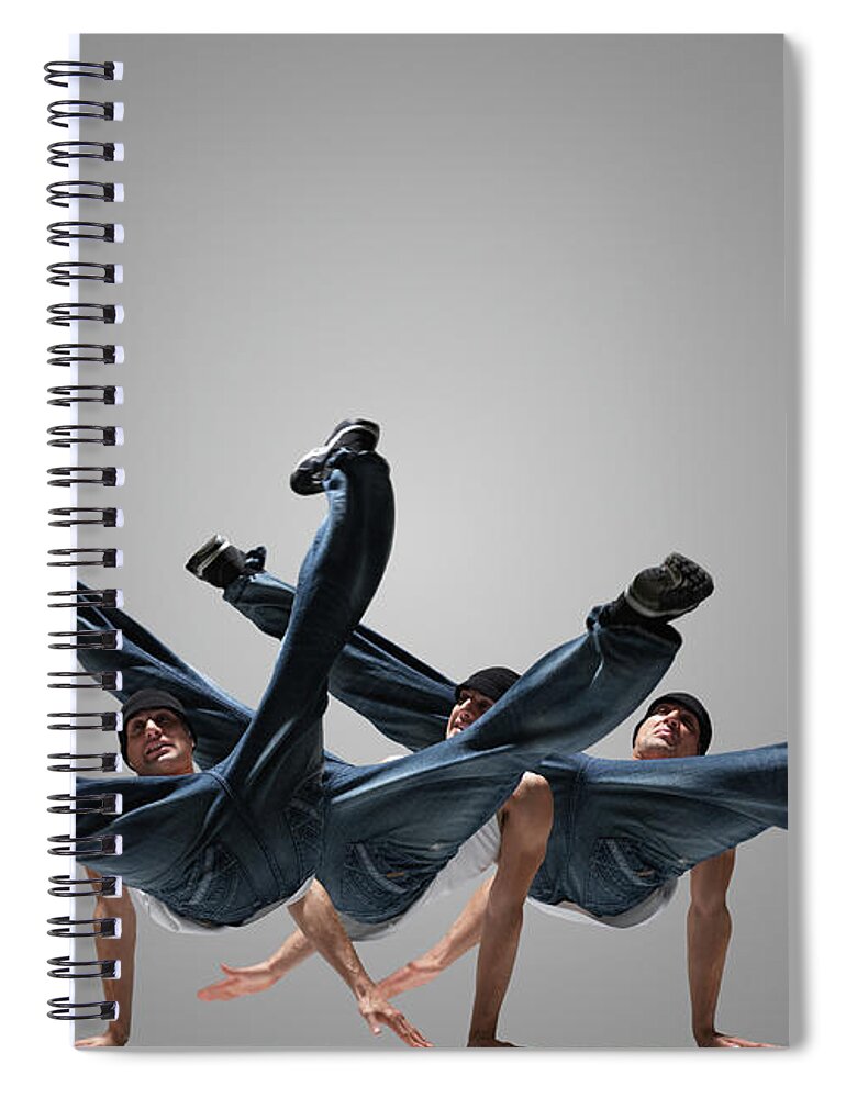 White Background Spiral Notebook featuring the photograph Male Breakdancer Performing Multiple by John Lamb