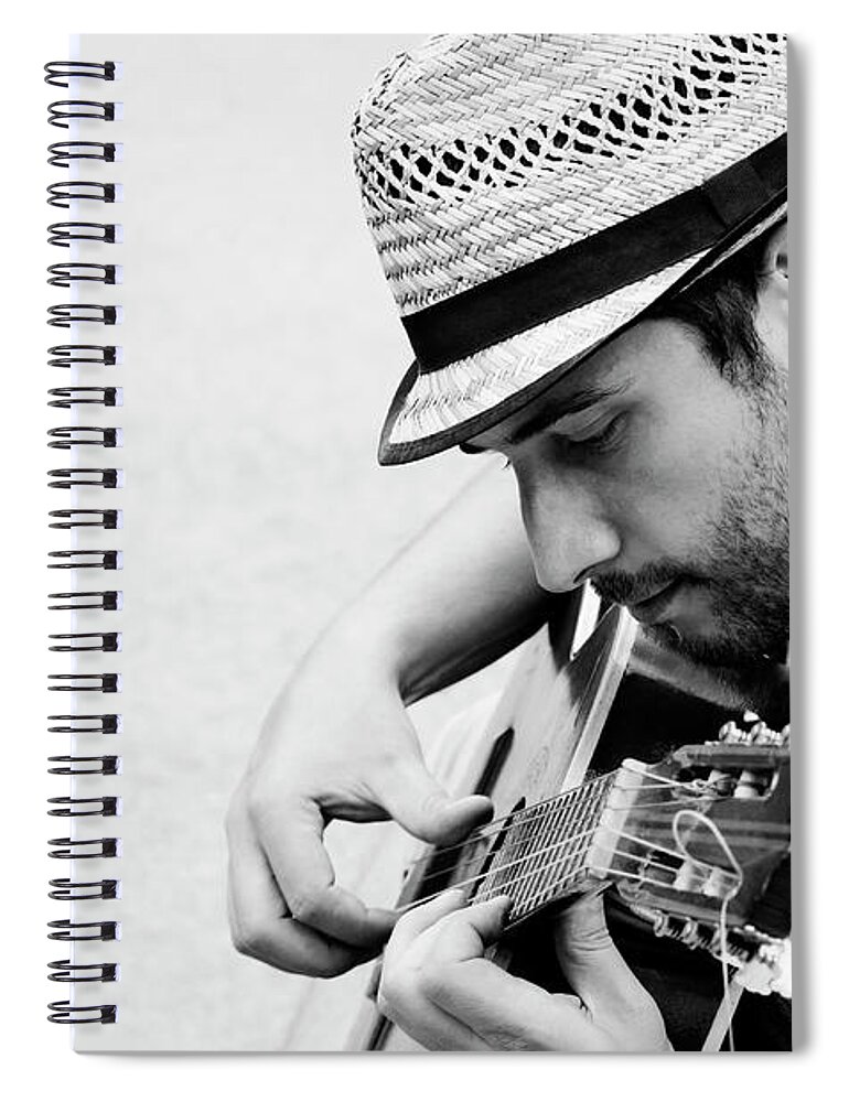 Guitar Spiral Notebook featuring the photograph Man plays the guitar by Jelena Jovanovic