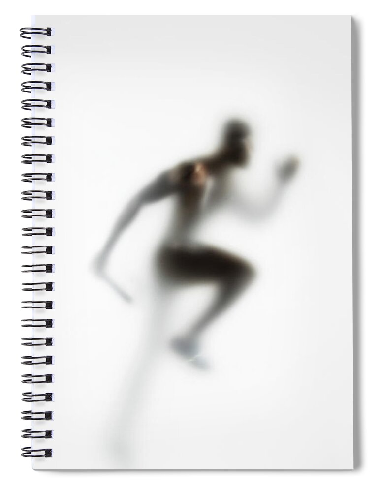 White Background Spiral Notebook featuring the photograph Man Running Relay Race, Carrying Baton by Symphonie