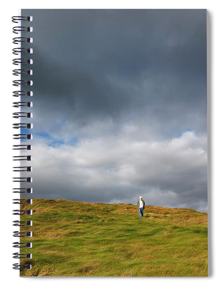 Tranquility Spiral Notebook featuring the photograph Man Walking Down The Hill At Galley Head by Ken Welsh / Design Pics