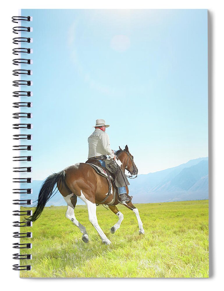 One Man Only Spiral Notebook featuring the photograph Mature Cowboy Riding Painted Mustang by Stephen Swintek