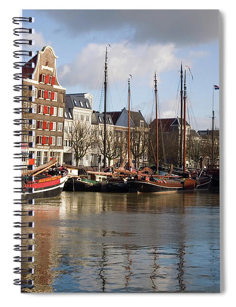 Netherlands Spiral Notebook featuring the photograph Medieval Harbour With Traditional Ships by Roel Meijer
