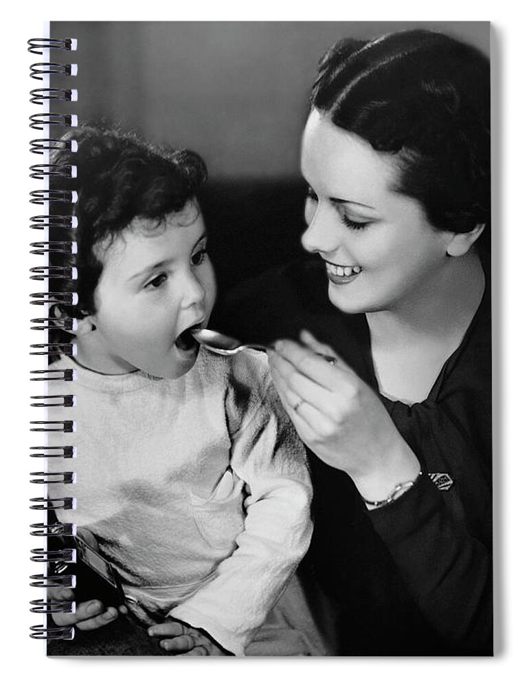 Child Spiral Notebook featuring the photograph Mother Giving Medicine To Daughter by George Marks