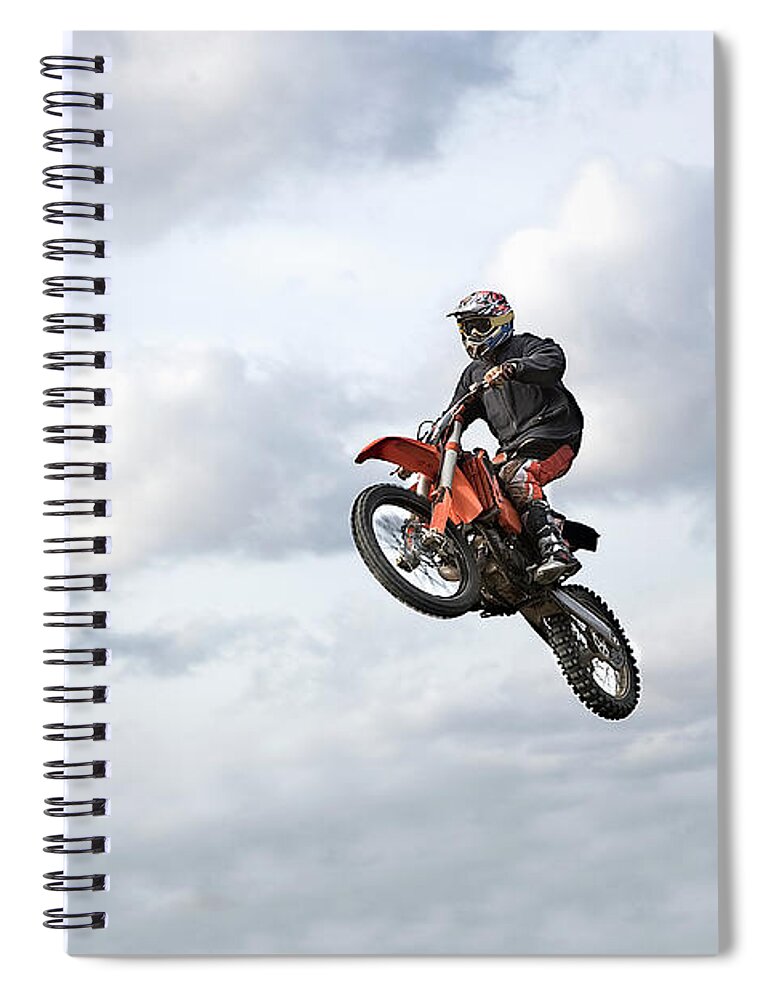 Recreational Pursuit Spiral Notebook featuring the photograph Motocross Rider In Mid-air, Low Angle by Claus Christensen