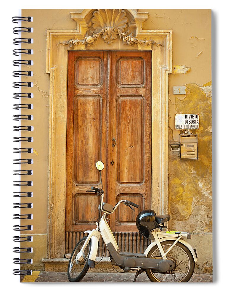 Crash Helmet Spiral Notebook featuring the photograph Motorcycle Parked In Front Of Wooden by Caracterdesign