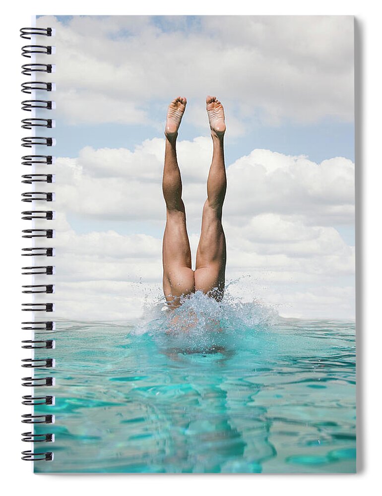 Diving Into Water Spiral Notebook featuring the photograph Nude Man Diving by Ed Freeman
