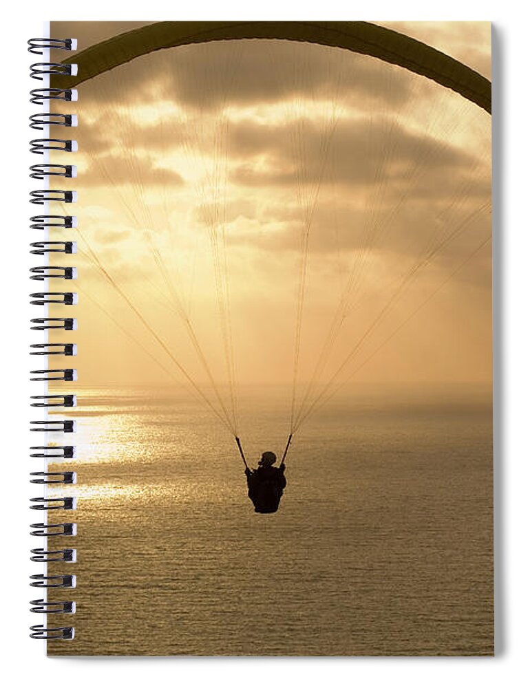 Photography Spiral Notebook featuring the photograph Paraglider Flying In The Sky Over An by Panoramic Images