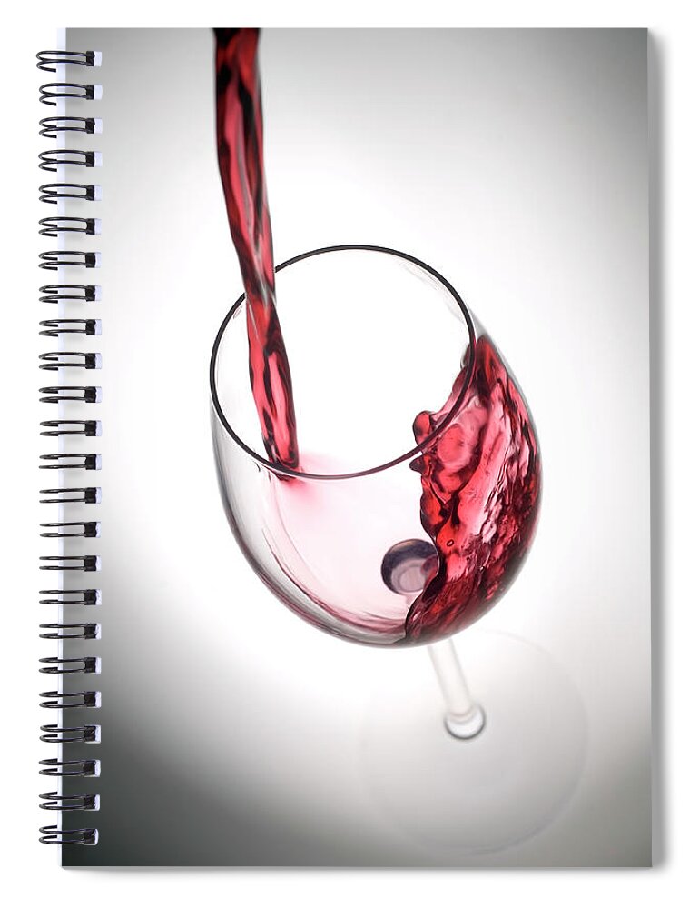 Alcohol Spiral Notebook featuring the photograph Pouring Red Wine Into A Glass by Stockcam