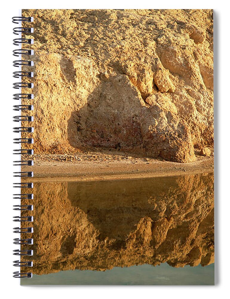 Tranquility Spiral Notebook featuring the photograph Reflection In Water Of Eroding Cliff by Timothy Hearsum