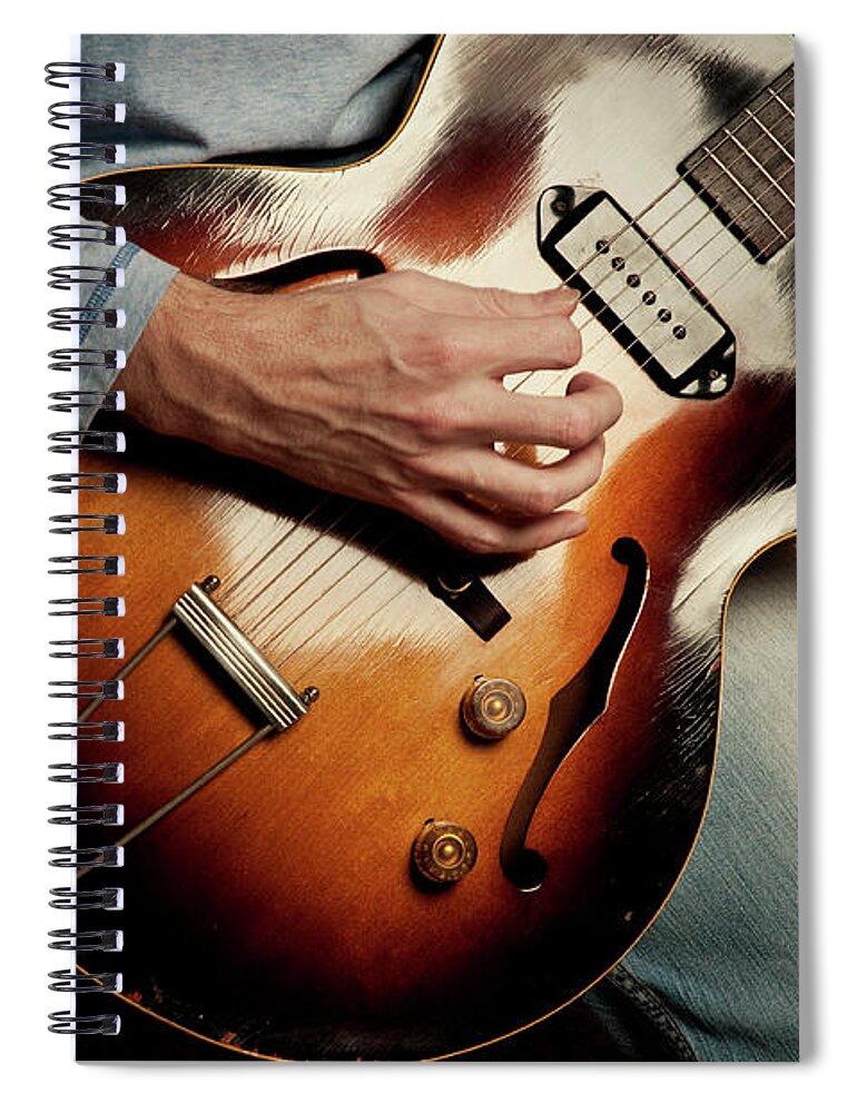 Rock Music Spiral Notebook featuring the photograph Rock N Roll Guitar On Black Background by Bns124