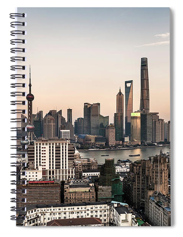 Orange Color Spiral Notebook featuring the photograph Shanghai Skyline At Dusk by Martin Puddy
