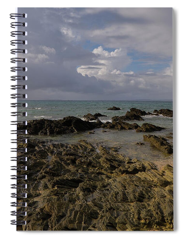 Stormy Spiral Notebook featuring the photograph Shining through the Storm by Eric Hafner