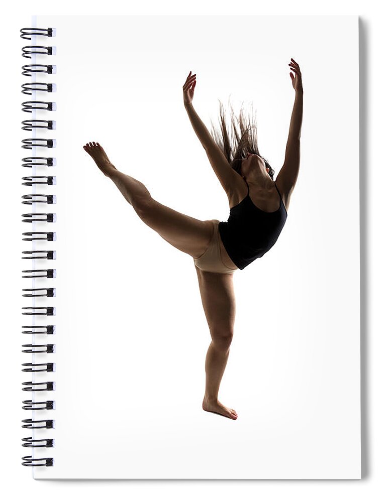 Ballet Dancer Spiral Notebook featuring the photograph Silhouette Of A Performing Dancer by Opla