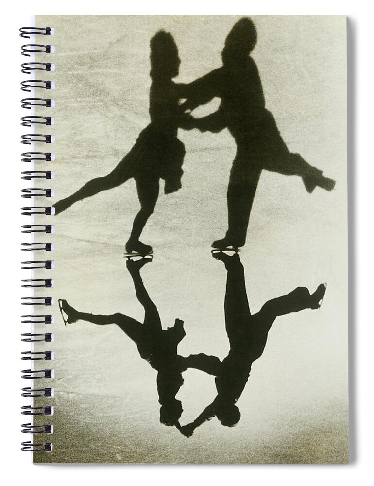 Shadow Spiral Notebook featuring the photograph Silhouette Of Couple Ice Skating by Fpg