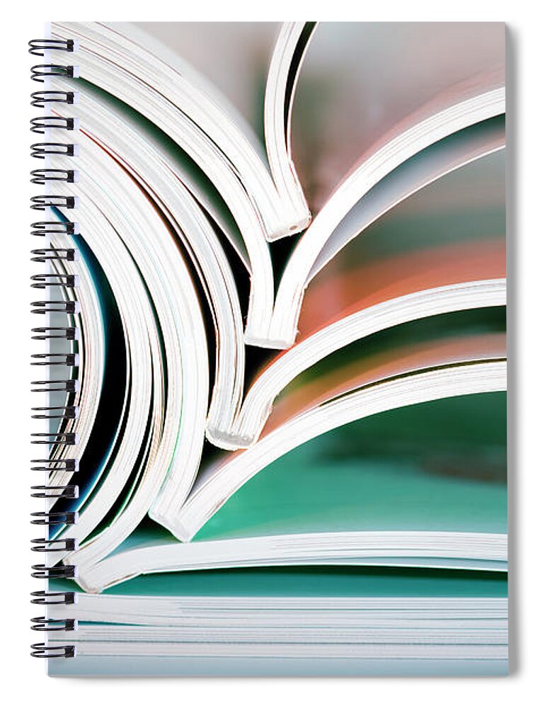 Material Spiral Notebook featuring the photograph Stack Of Opened Magazines by Mordolff