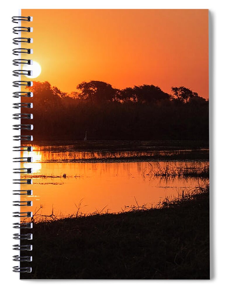 Sunset Spiral Notebook featuring the photograph Sunset on the Chobe river by Claudio Maioli