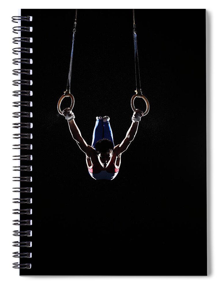 Hanging Spiral Notebook featuring the photograph Teenage 16-17 Male Gymnast Practicing by Thomas Barwick