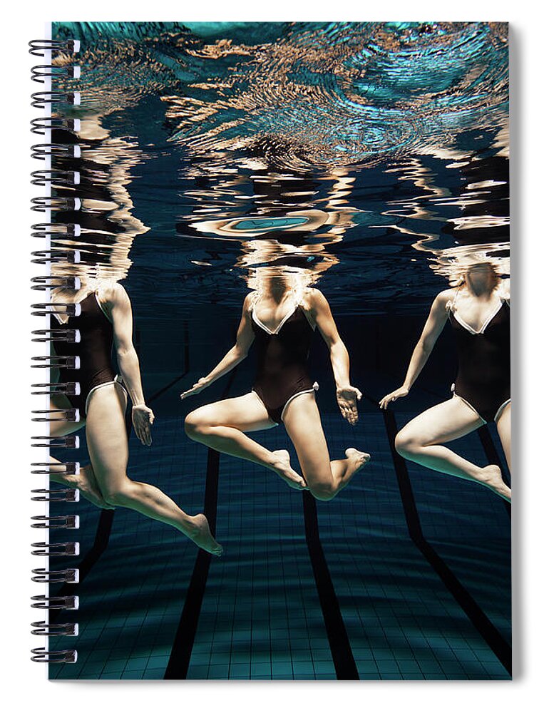 Underwater Spiral Notebook featuring the photograph Three Synchronised Swimmers In Line by Henrik Sorensen