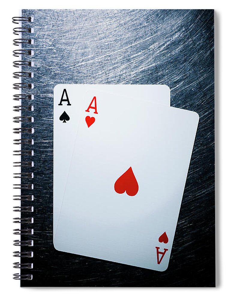 Two Objects Spiral Notebook featuring the photograph Two Aces Playing Cards On Stainless by Ballyscanlon
