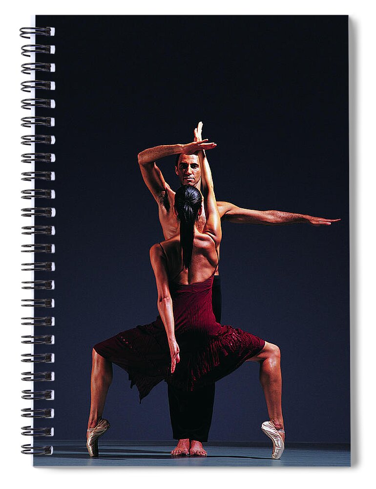 Expertise Spiral Notebook featuring the photograph Two Ballet Dancers Standing Face To by Chris Nash