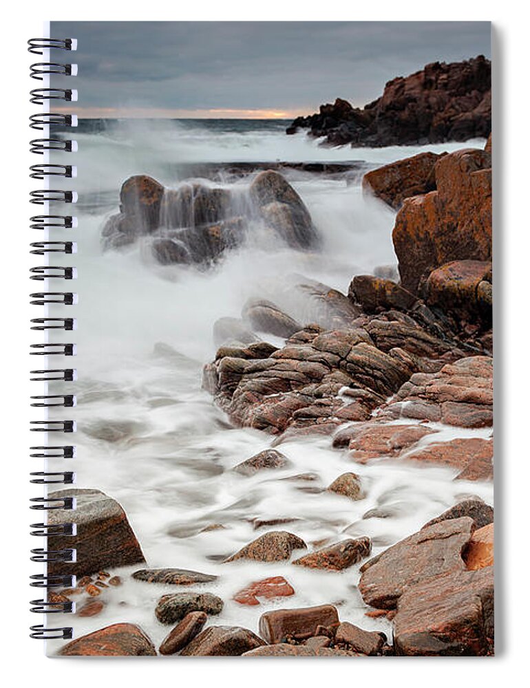 Sunset Spiral Notebook featuring the photograph Waves crashing at rocks by Sophie McAulay