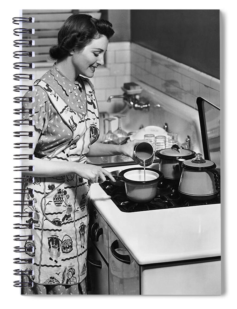 Working Spiral Notebook featuring the photograph Woman Preparing Food On Stove by George Marks
