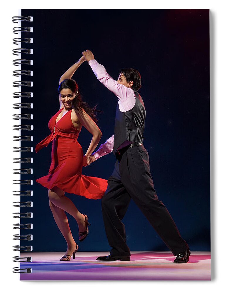 Young Men Spiral Notebook featuring the photograph Young Couple Swing Dancing Indoors by Pm Images