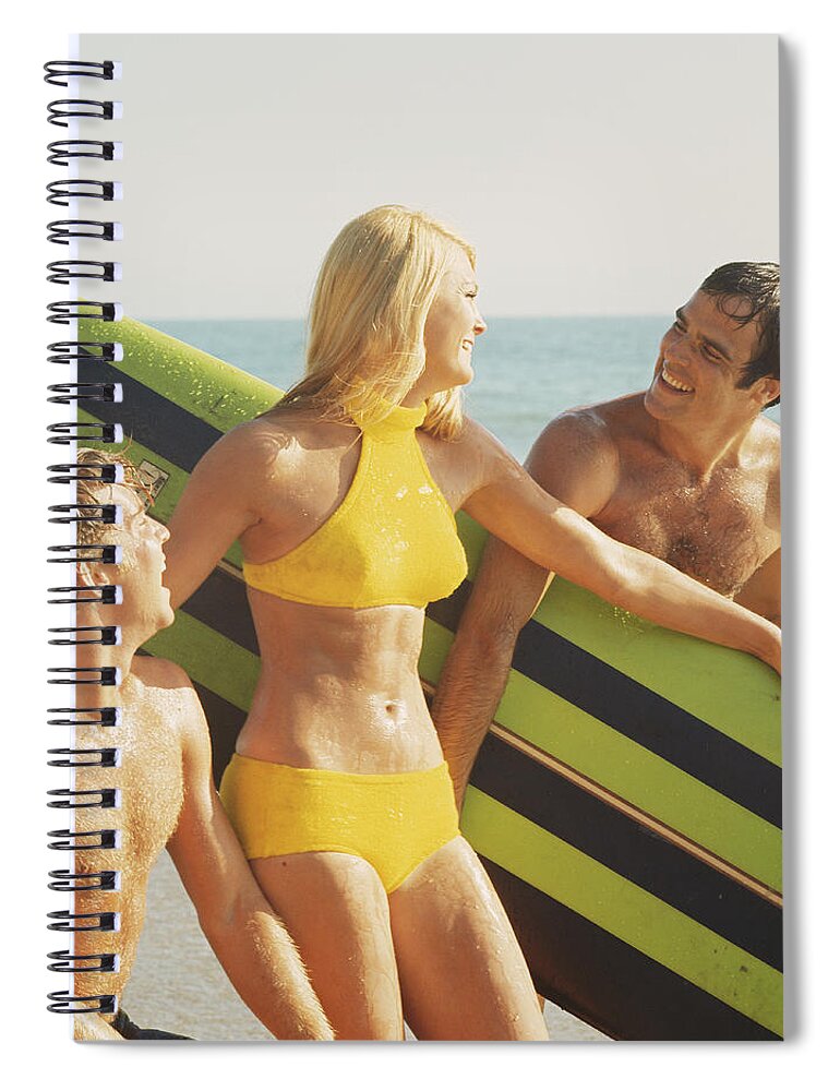 Young Men Spiral Notebook featuring the photograph Young Women And Men With Surfboard On by Tom Kelley Archive