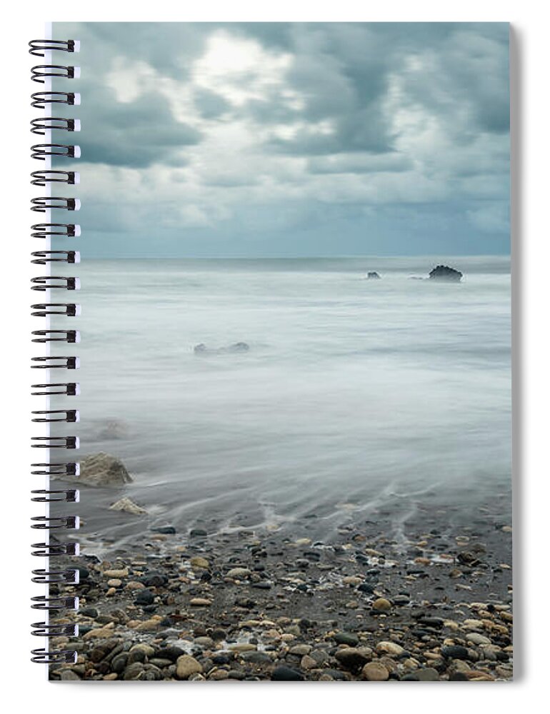 Seascape Spiral Notebook featuring the photograph Seascape with windy waves during stormy weather a rocky coastline #1 by Michalakis Ppalis